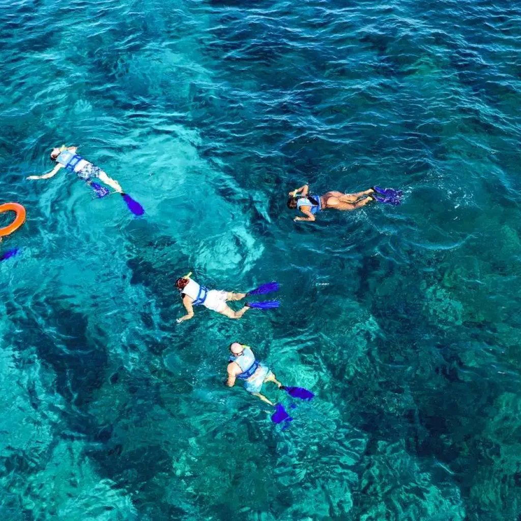 Explore Mayan Wonders & Caribbean Paradise: Chichen Itza Early Access & Isla Mujeres Catamaran for 2 days with Amigo Tours and discover unforgettable experiences - Photo 2
