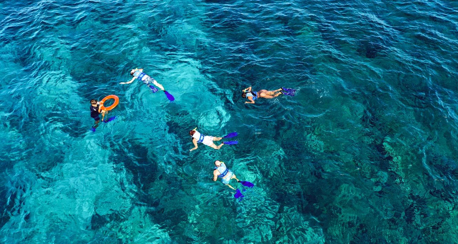 Explore Mayan Wonders & Caribbean Paradise: Chichen Itza Early Access & Isla Mujeres Catamaran for 2 days with Amigo Tours and discover unforgettable experiences - Photo 2