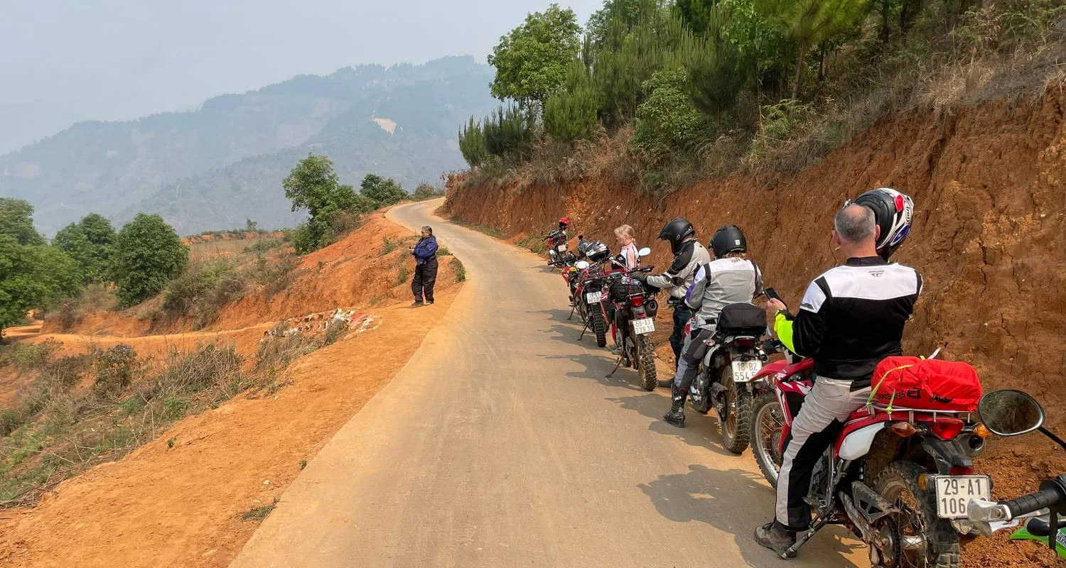 Explore Winding Vietnam Offroad Motorbike Tour to Ta Xua, Mu Cang Chai, Sapa, Luc Yen for 7 days with DNQ Travel and discover unforgettable experiences - Photo 2