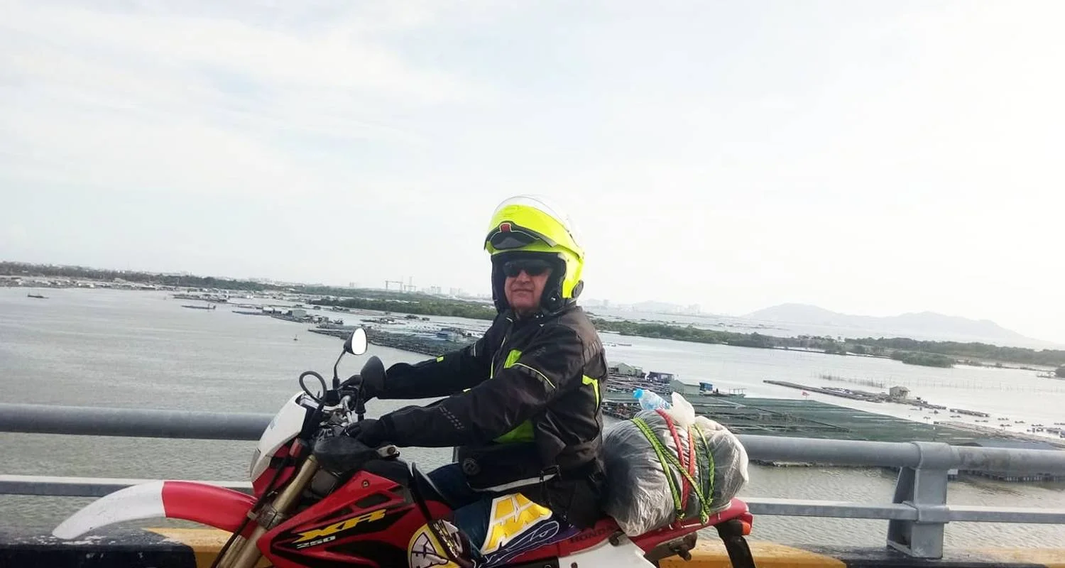 Explore BEST VIETNAM MOTORCYCLE TOUR DEEP INTO MEKONG DELTA for 6 days with DNQ Travel and discover unforgettable experiences - Photo 2