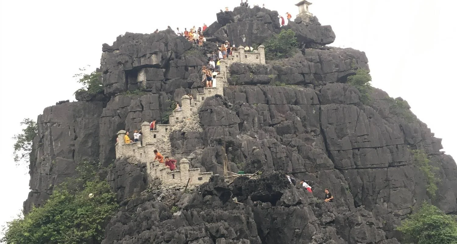 Explore 1 Day Trip to Hoa Lu - Tam Coc - Mua Cave (Ninh Binh) (join tour) for 1 days with Ideal Travel Asia and discover unforgettable experiences - Photo 2